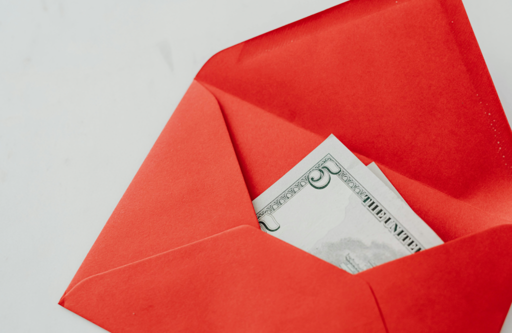 Red Envelope Partially Open Revealing One Hundred Dollar Bill Inside Against Light Solid Background – Sleek Money Concept Like Podcast Summary Cover or YouTube Thumbnail Creatorpoint – Creator Knowledge, Simplified. The best resources, podcast summaries, and learning for creators.